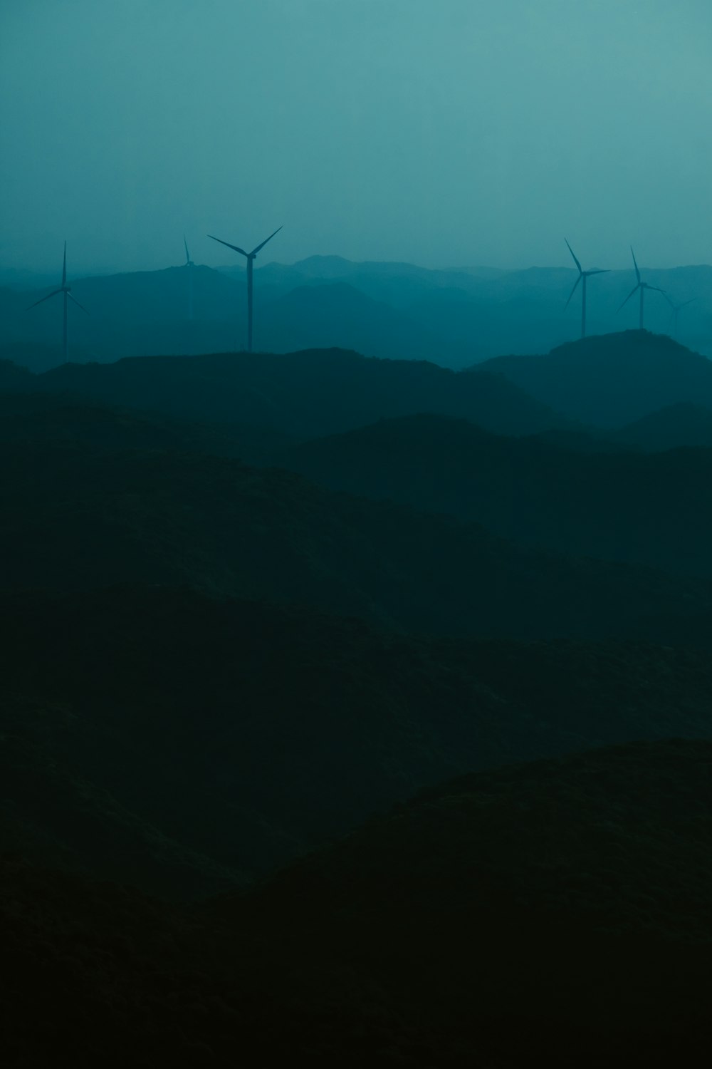 a group of wind turbines