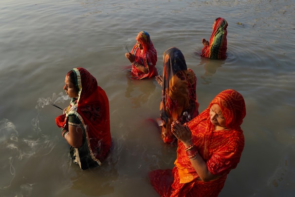 a group of people in the water
