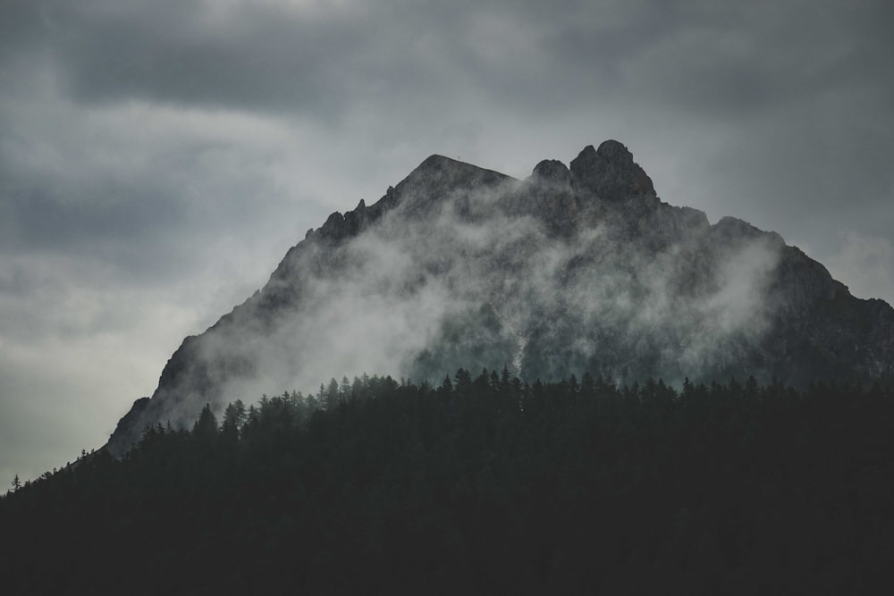 a mountain with clouds