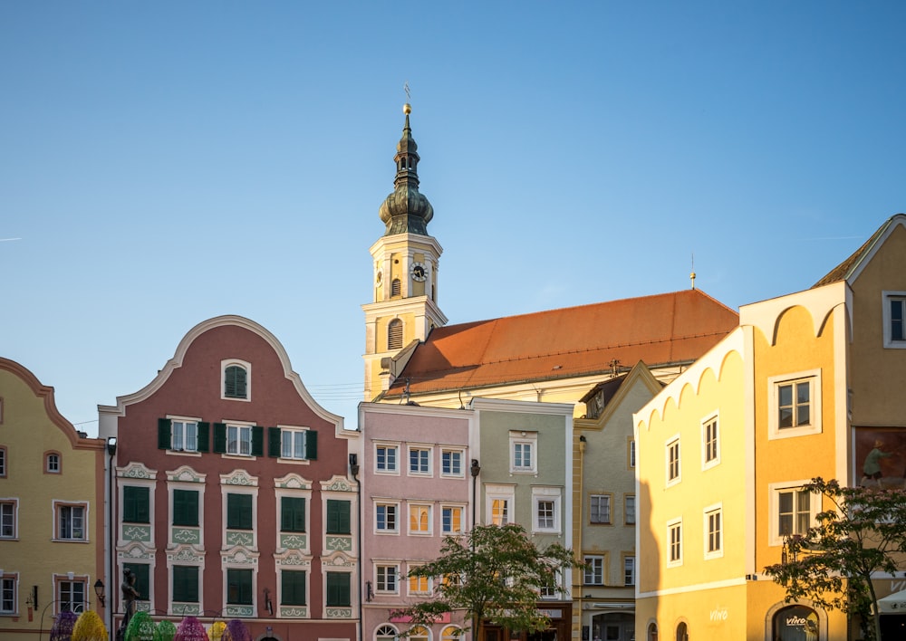 a group of buildings with a tower