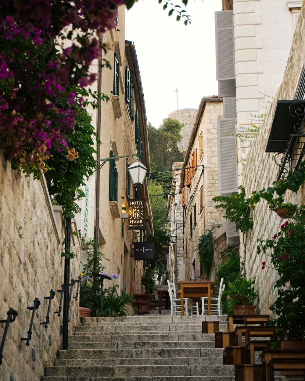 a stone street with buildings on both sides