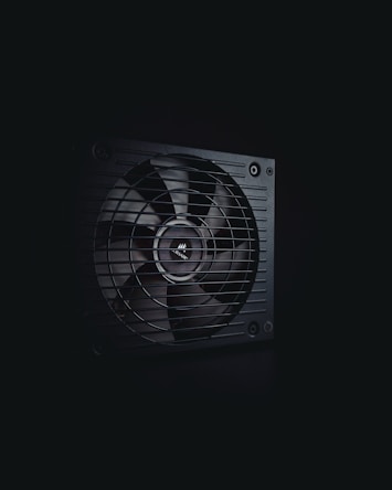 a black and white photo of a fan