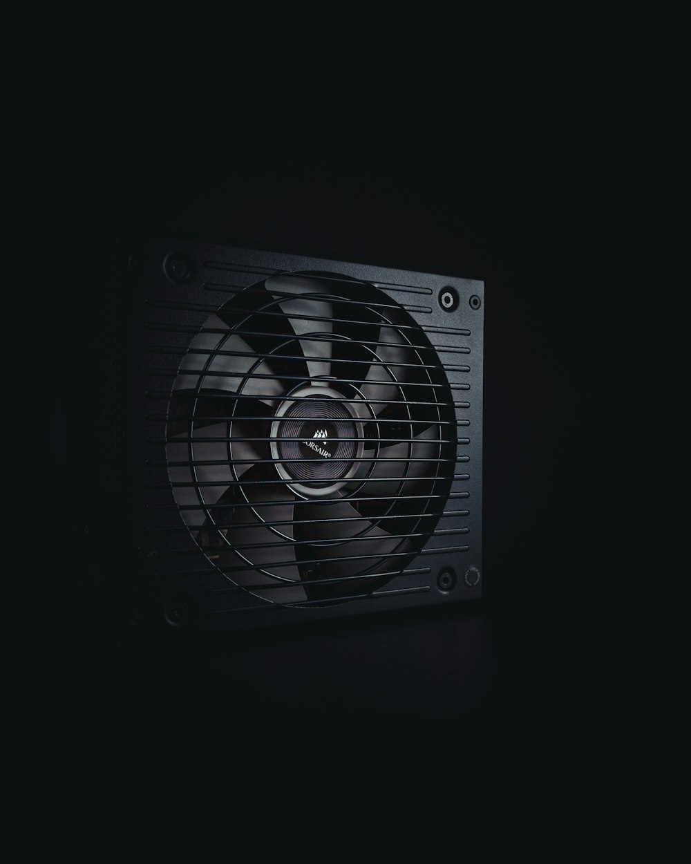 a black and white photo of a fan