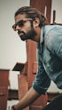 a man with a beard and sunglasses