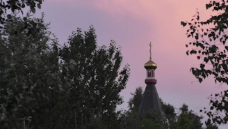A peaceful sunrise over a quiet church, symbolizing hope and new beginnings.