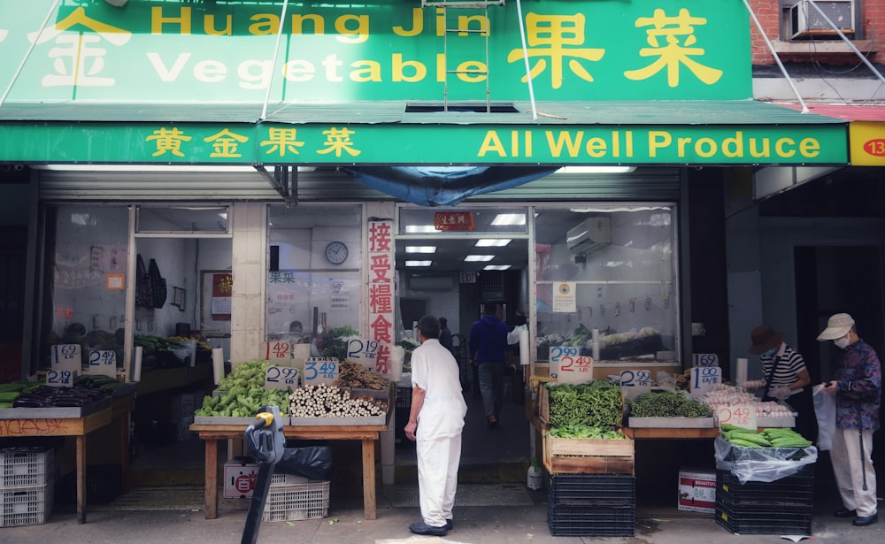 a group of people outside a store