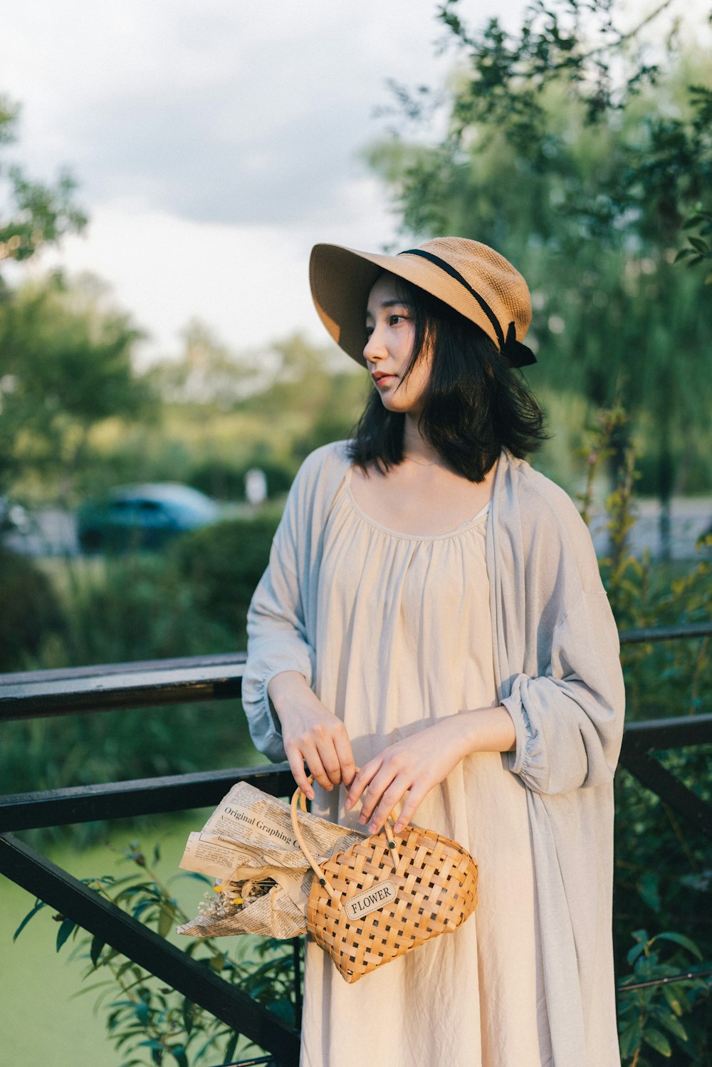 a person holding a basket of cookies