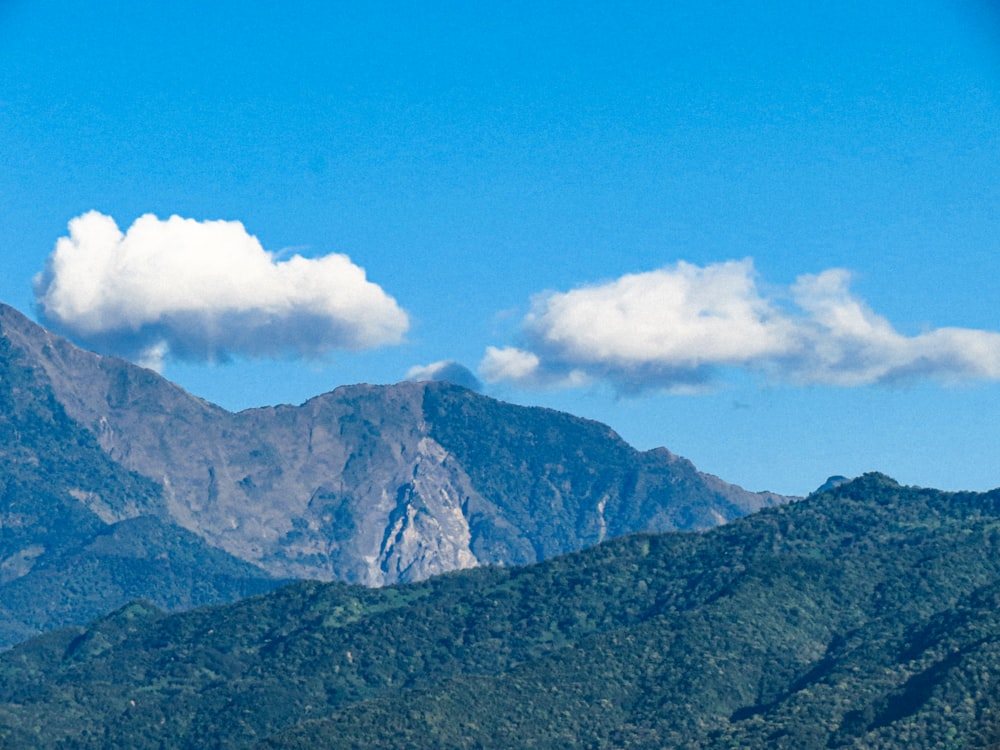 a mountain with clouds