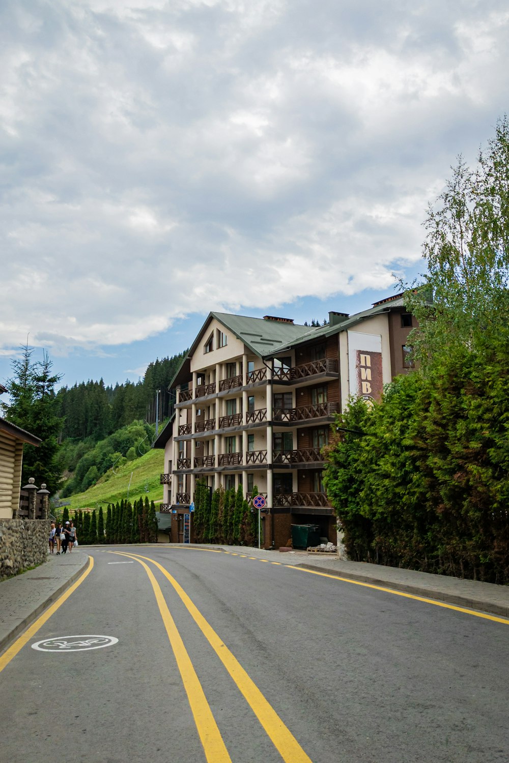 a street with a row of houses on the side