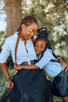a person holding a child