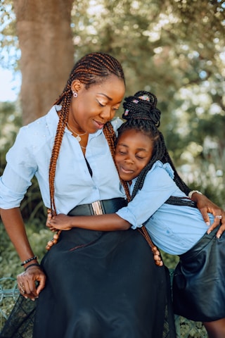 a person holding a child