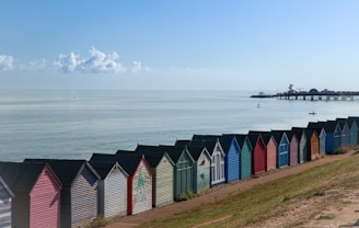 a row of colorful buildings by the water