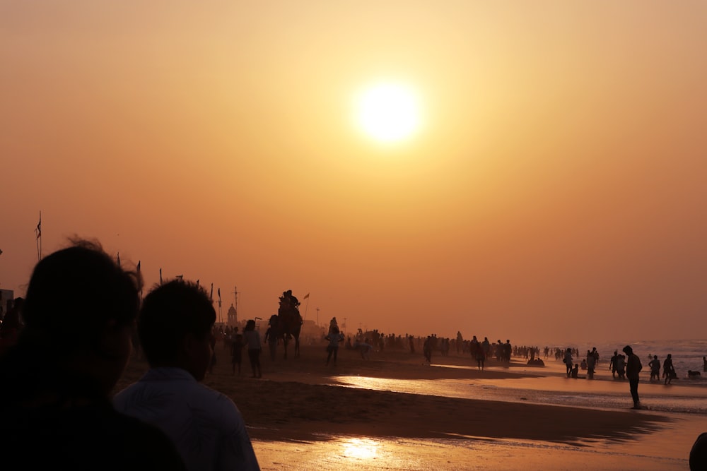 a group of people on a beach