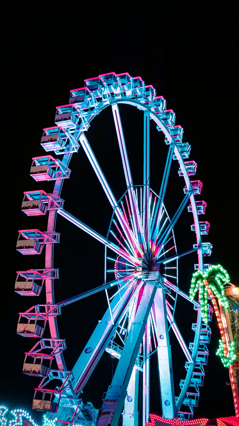 a ferris wheel at night