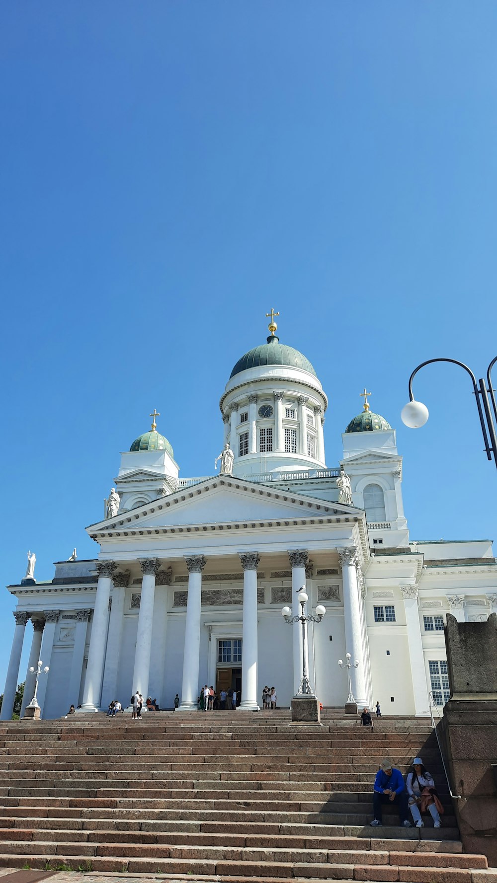 a building with a domed roof and pillars