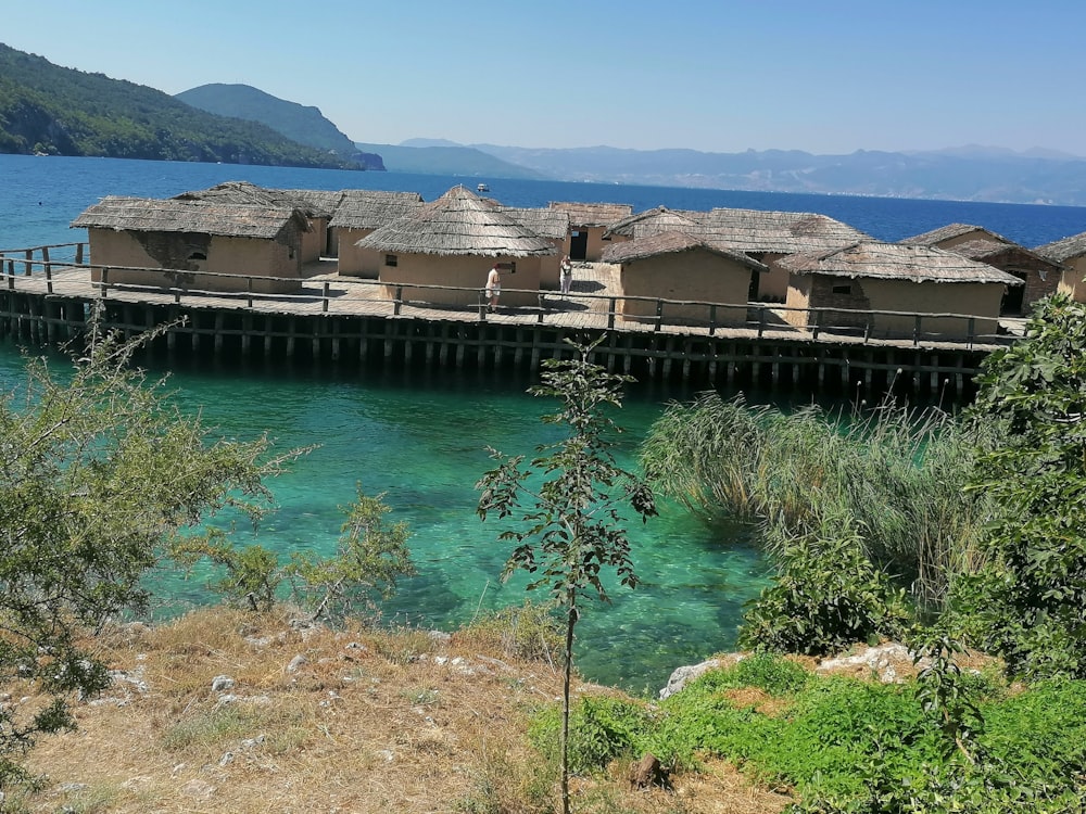 a building on a dock over a body of water