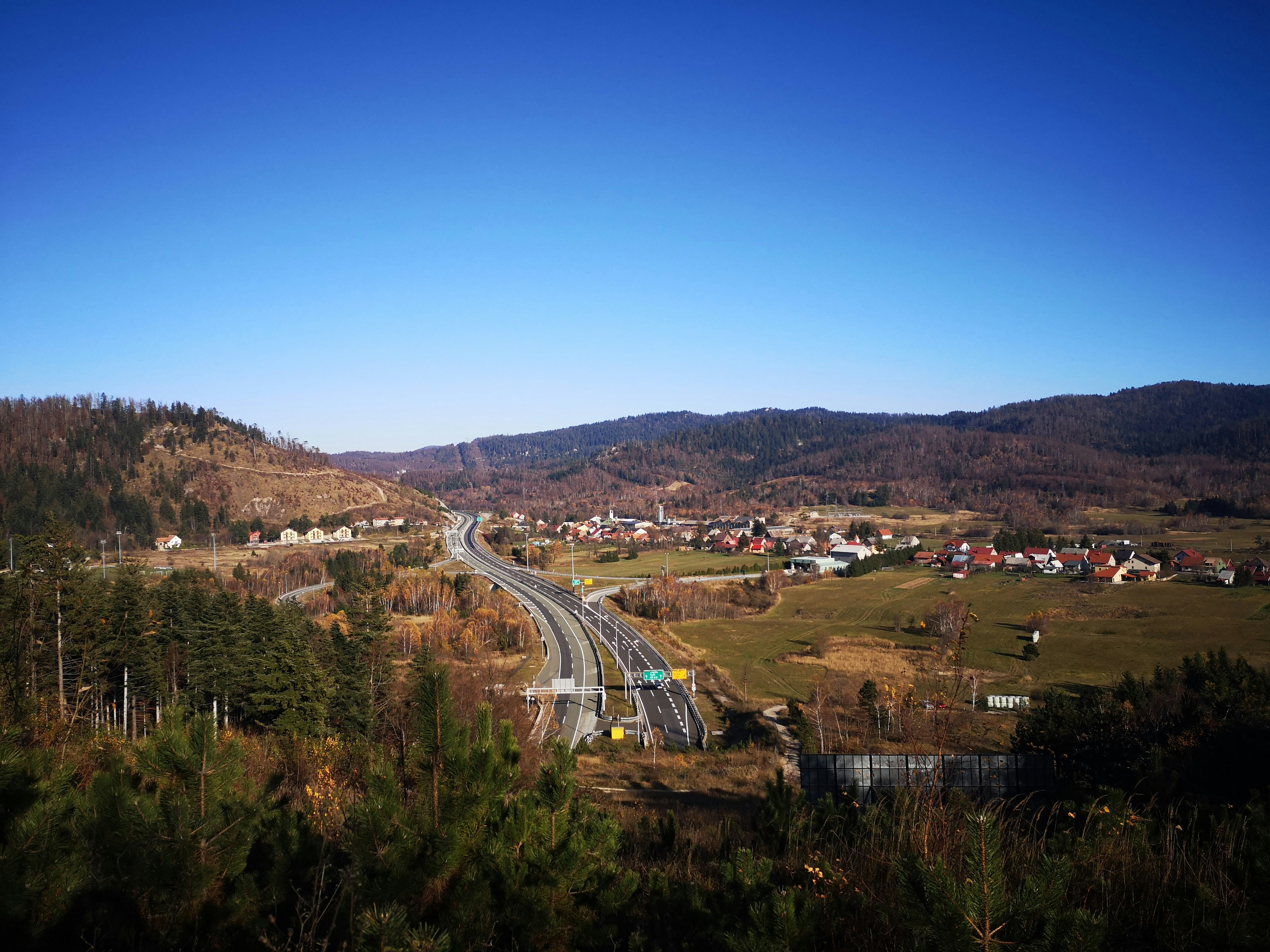 A road with a bridge over it
