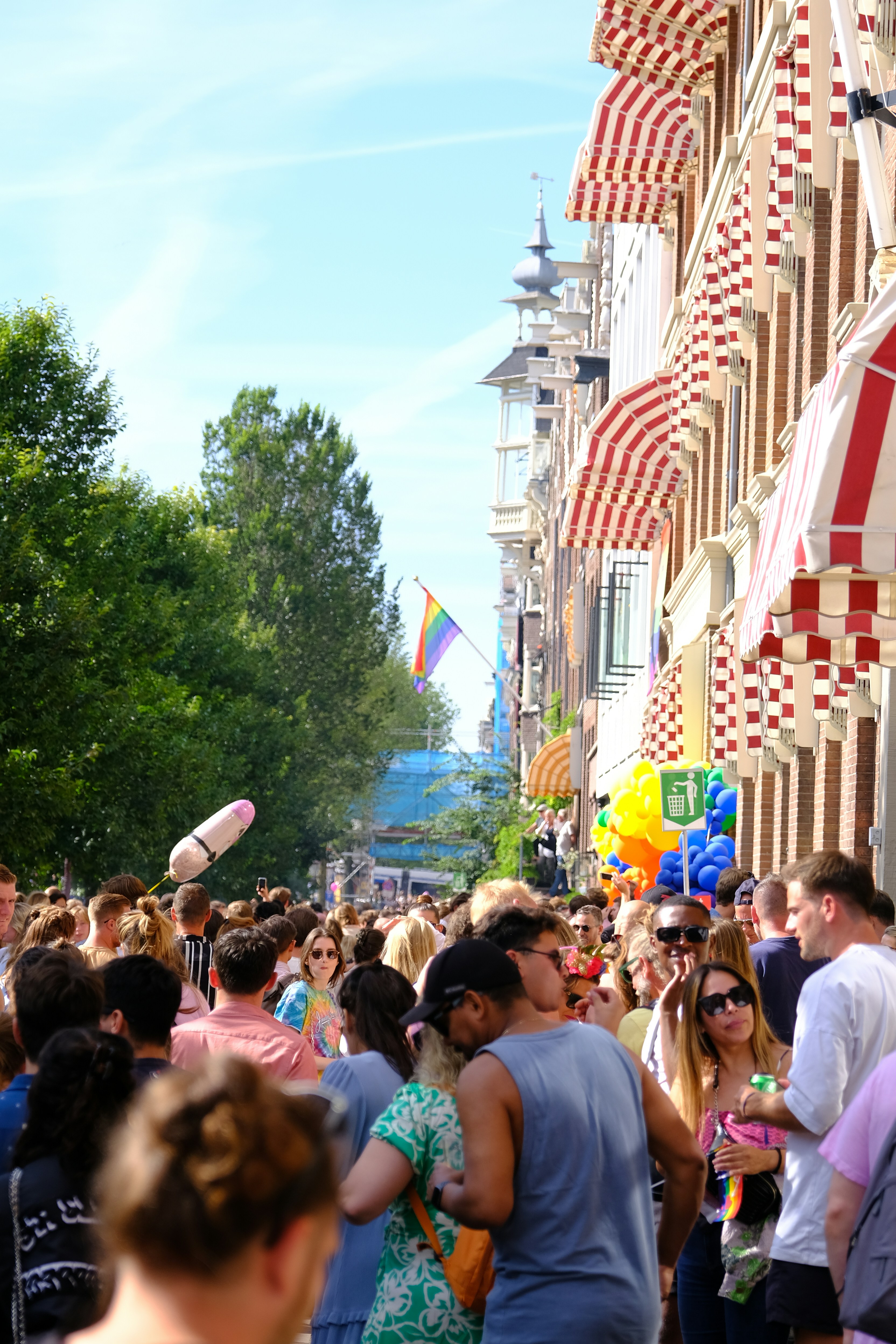 How to Find Local Festivals and Events Most Tourists Miss – a crowd of people walking down a street
