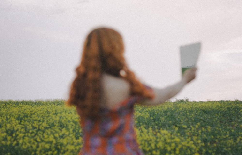 a person holding a laptop