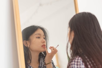 a woman looking at another woman