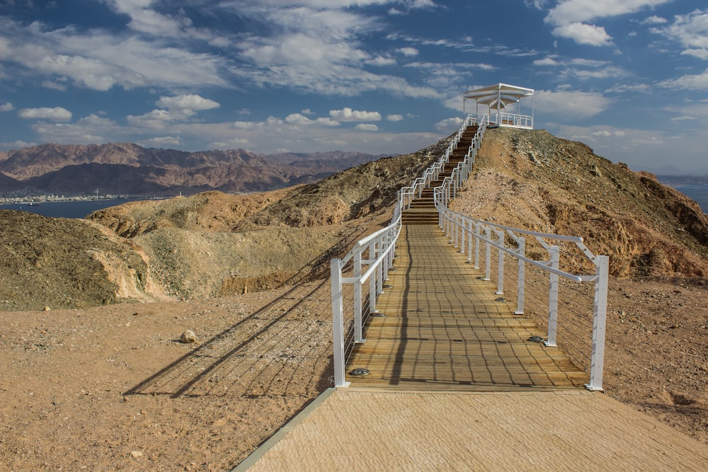 a wooden bridge over a river