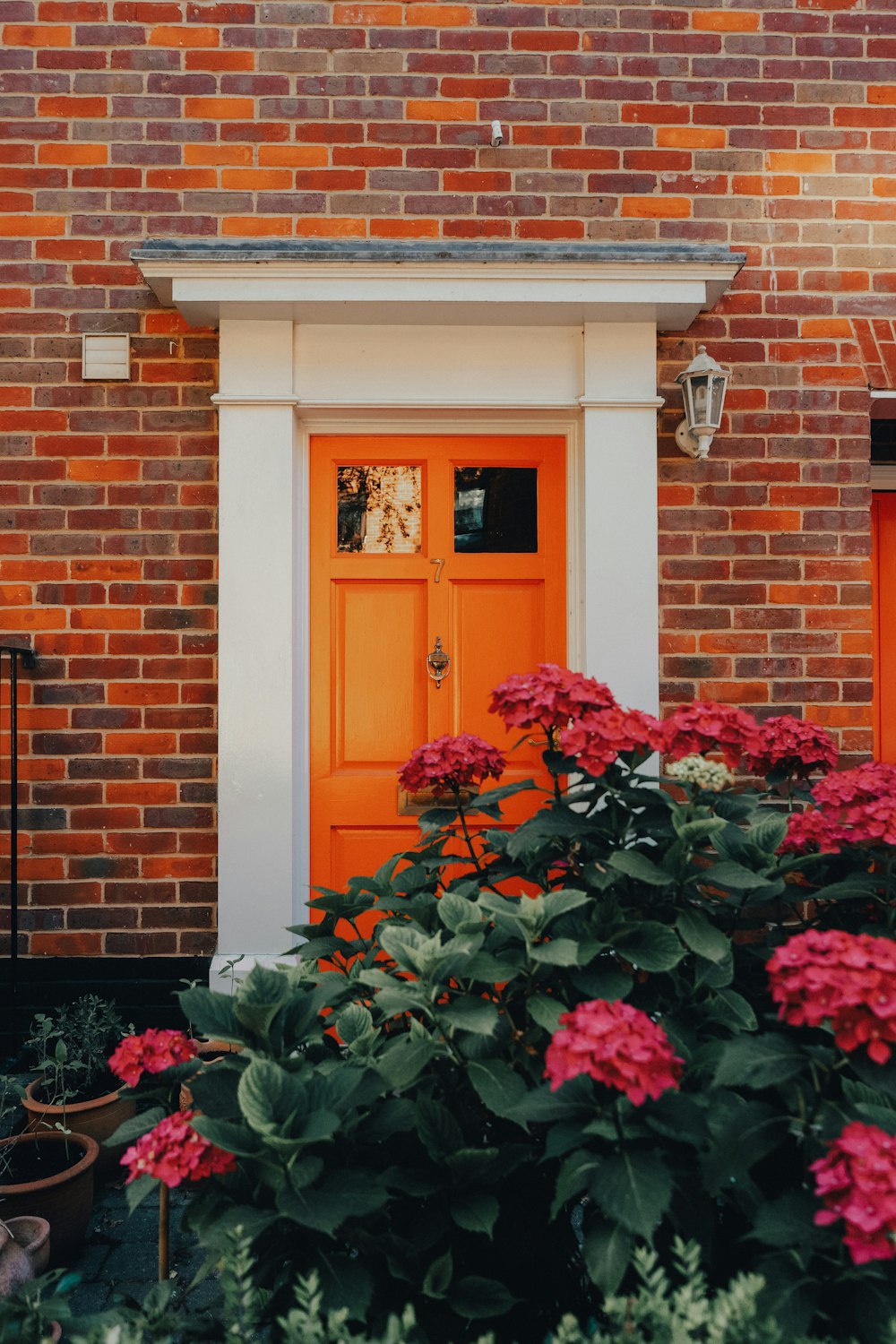 a door with flowers in front of it