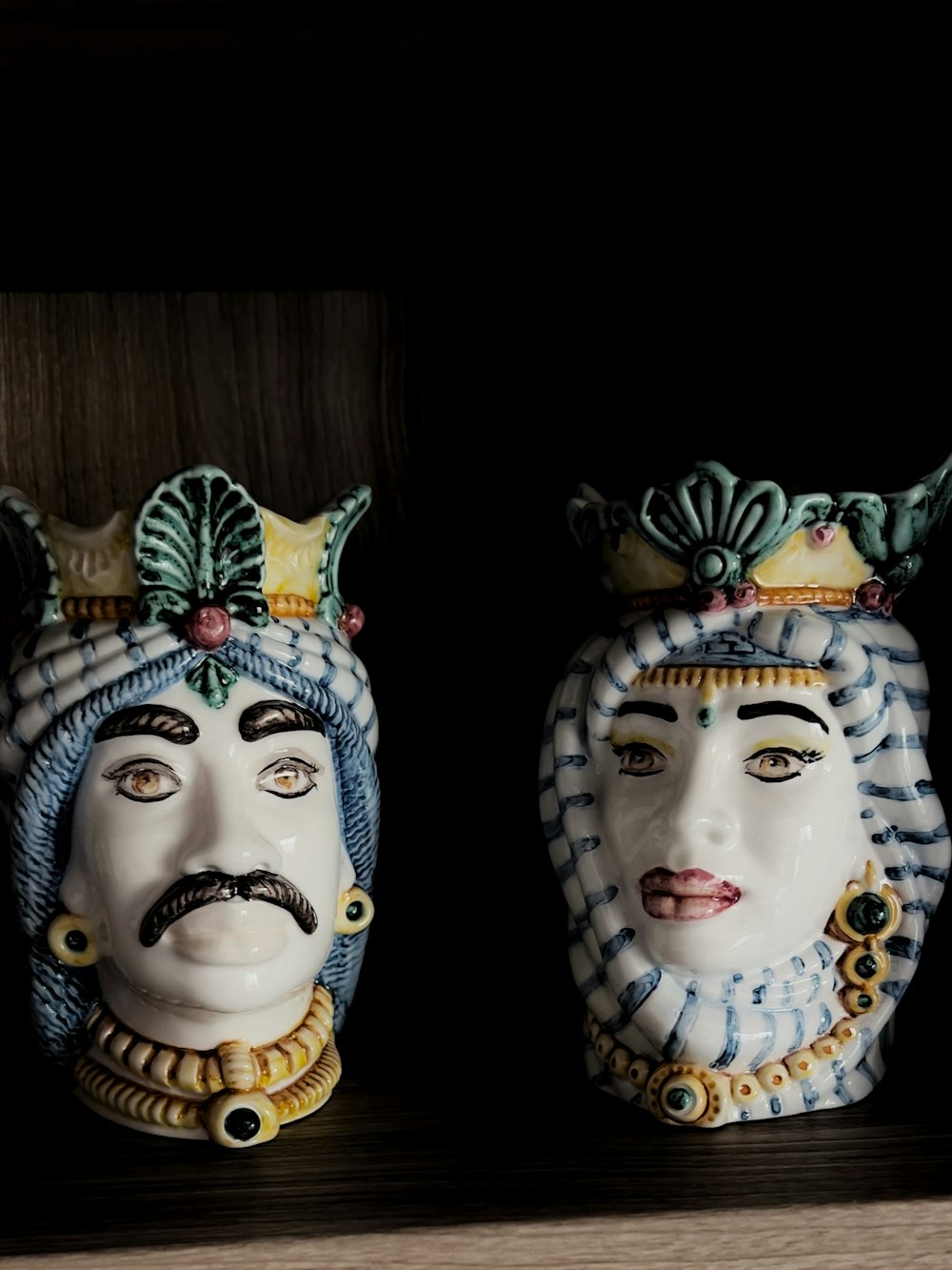a couple of masks with faces