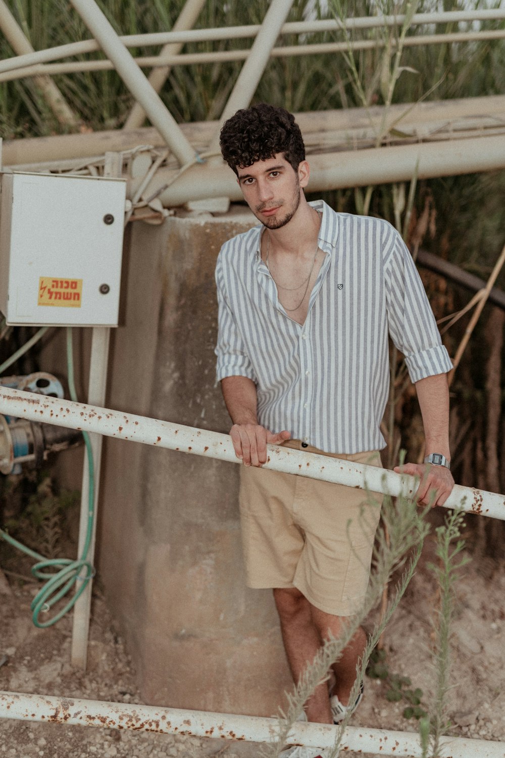 a man holding a metal bar