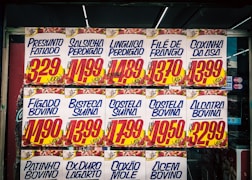 a sign with different colored text