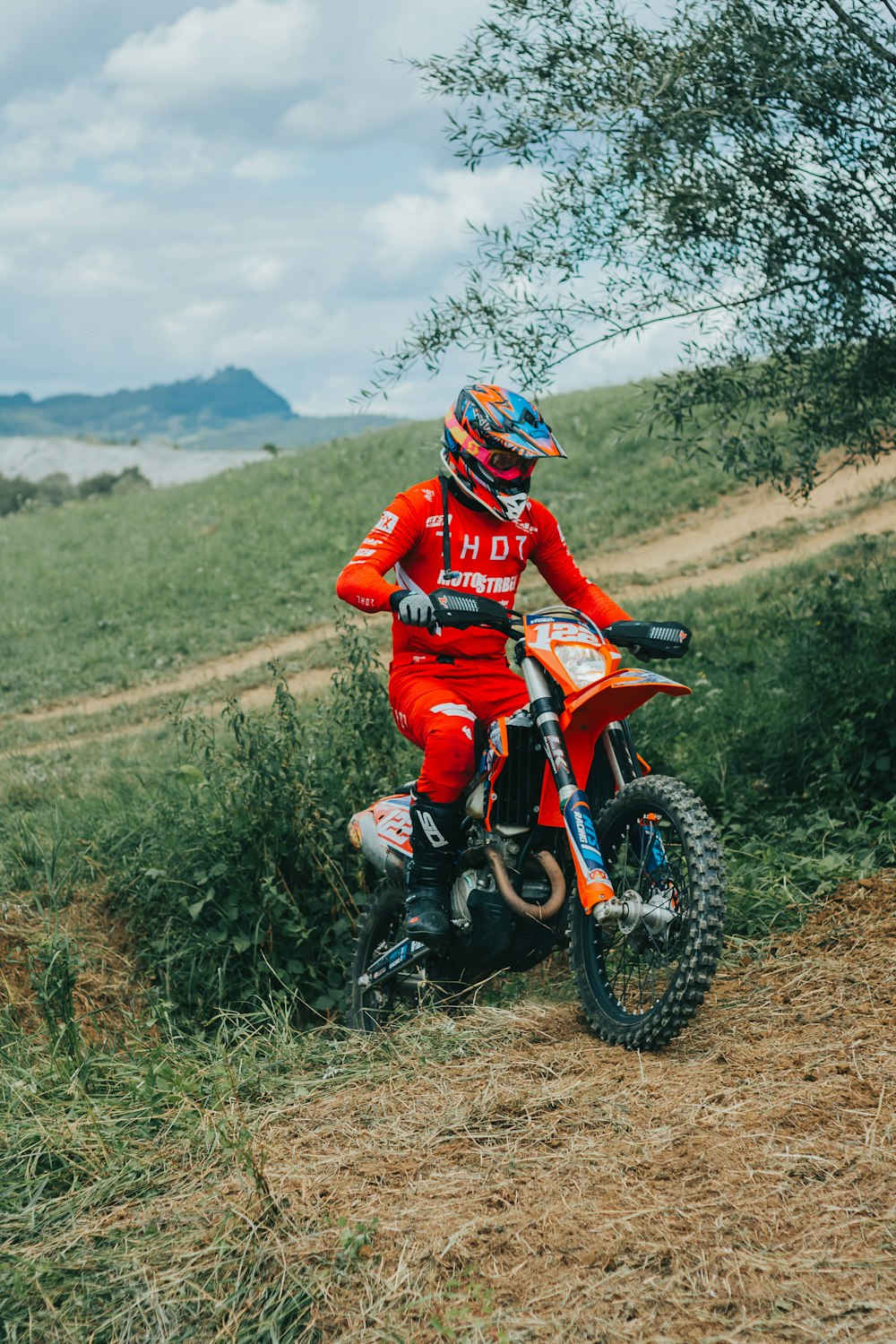 a man riding a dirt bike