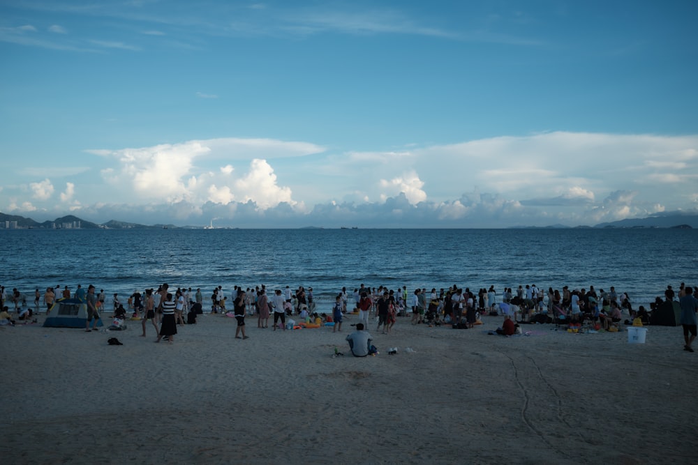 a large group of people at a beach