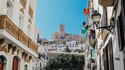 a street with buildings and a lamp post
