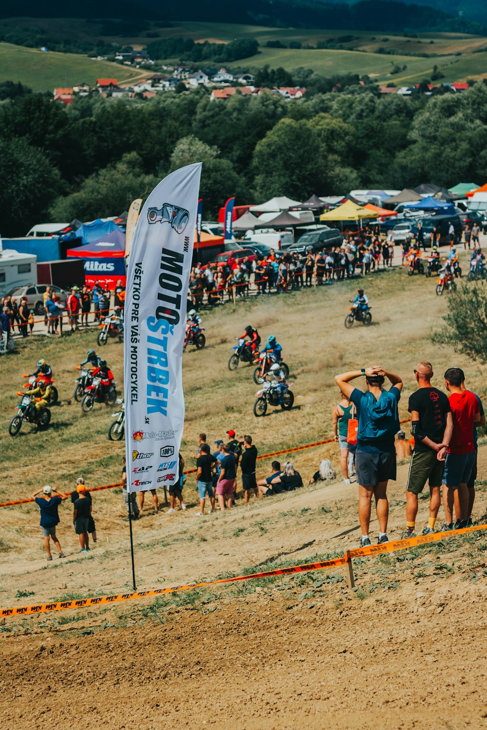 a group of people at a bike race