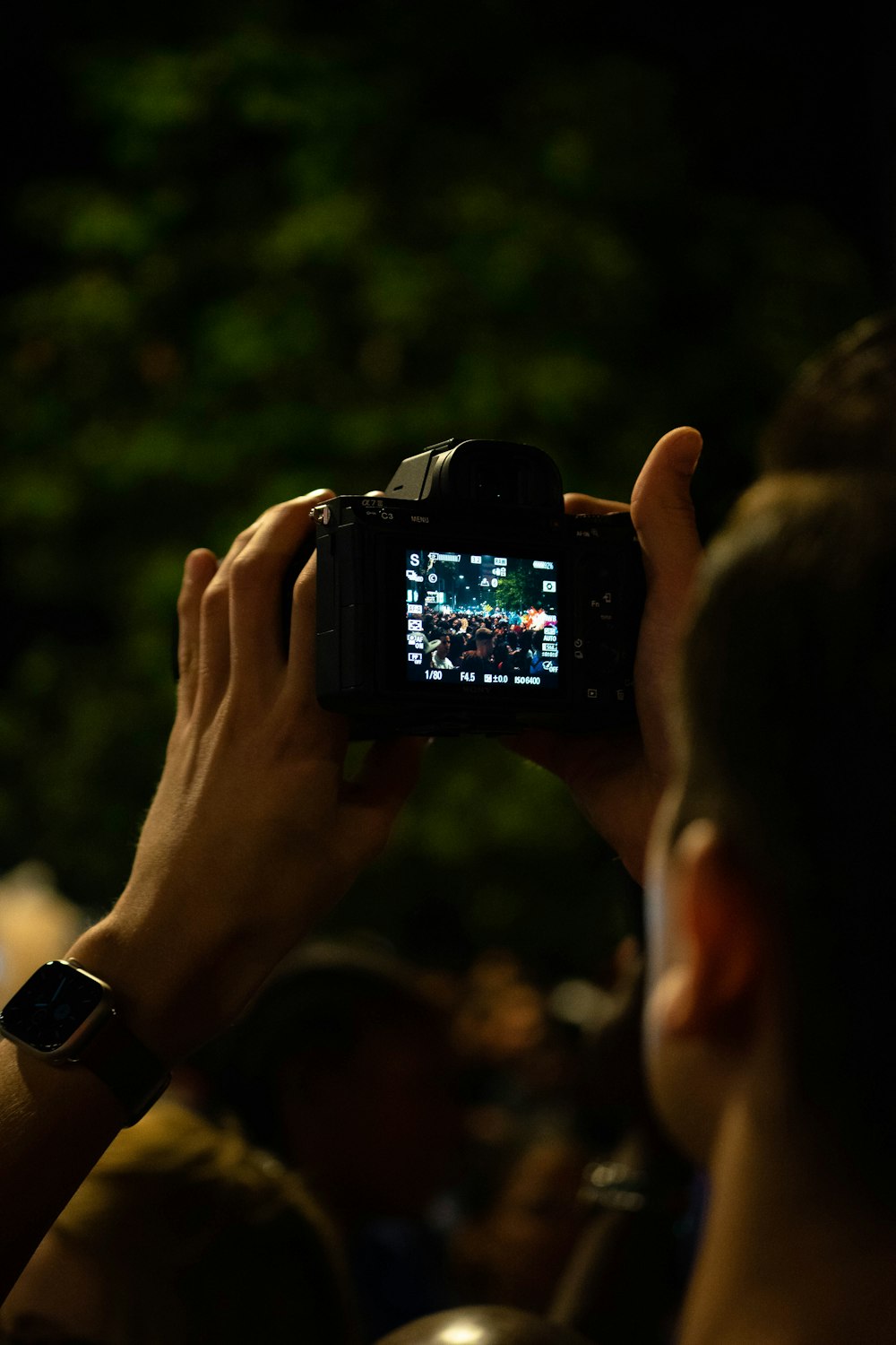 a person holding a camera