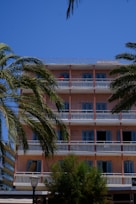 A stunning aerial view of Max Palace's penthouse exterior under a bright Florida sky.