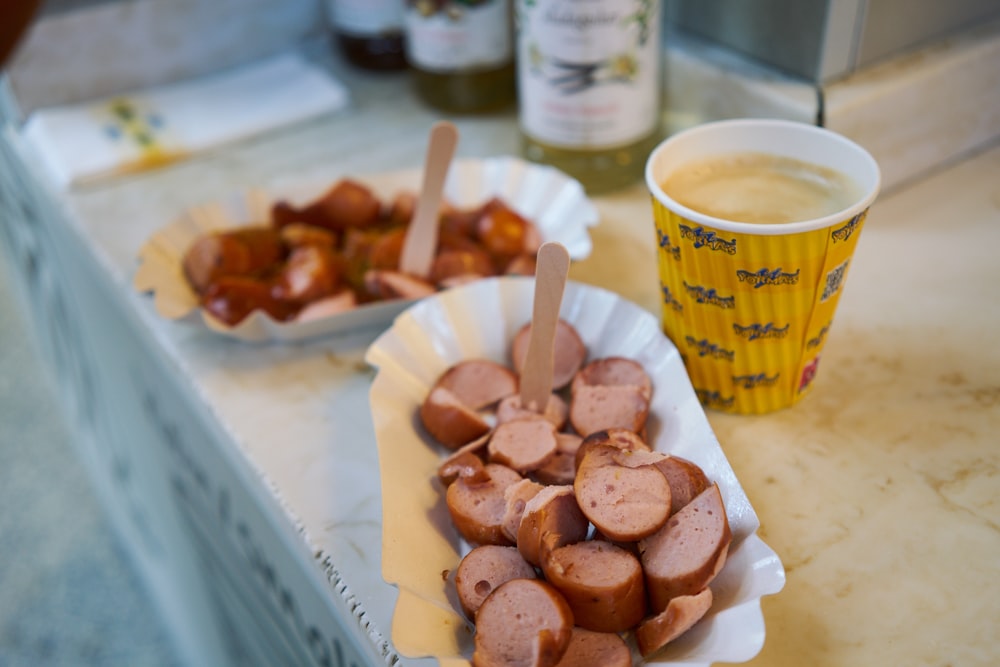 a plate of food and a cup of coffee