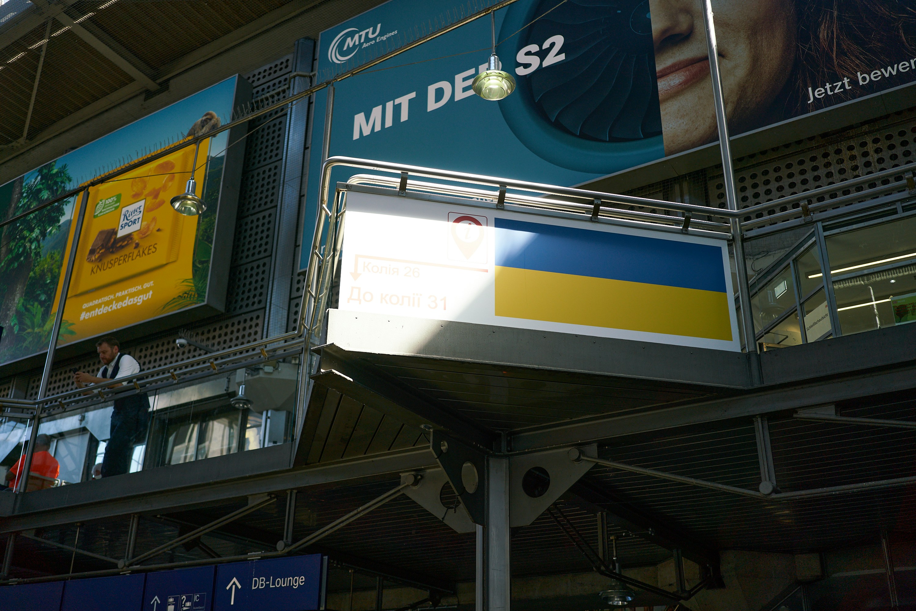 a large blue and white sign