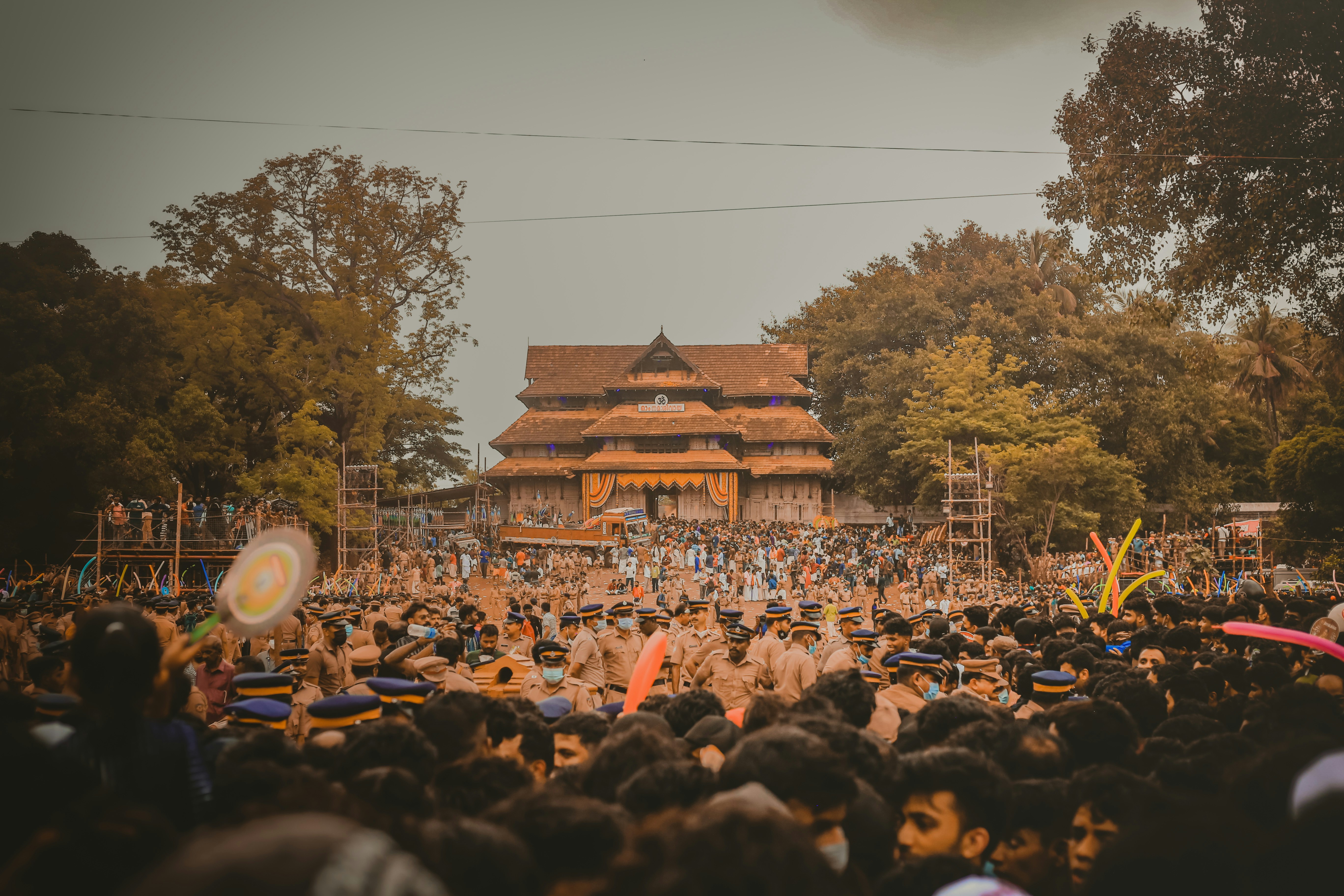 A large crowd of people in front of a building photo – Free Building ...