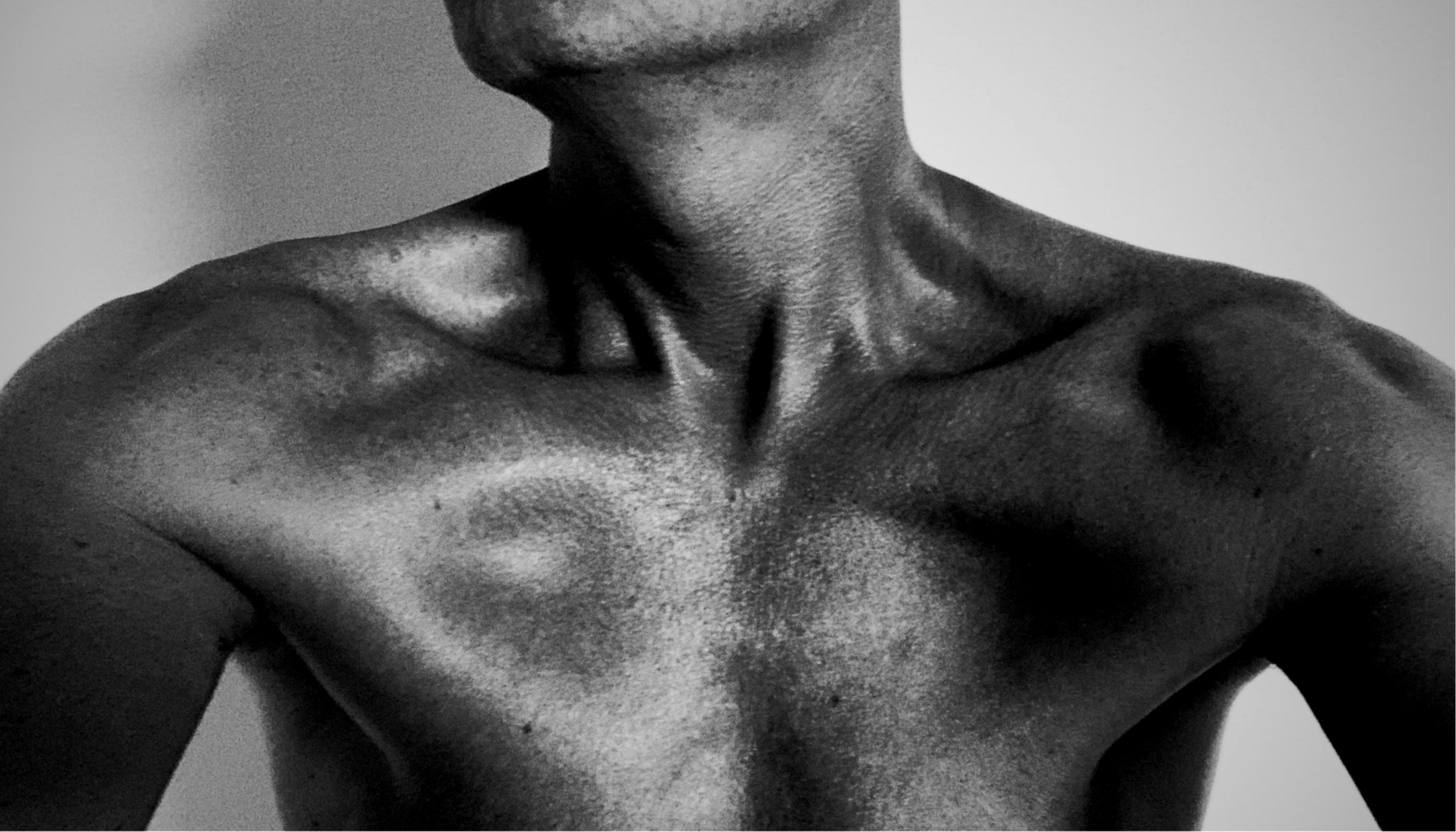 a man with a tattoo on his arm