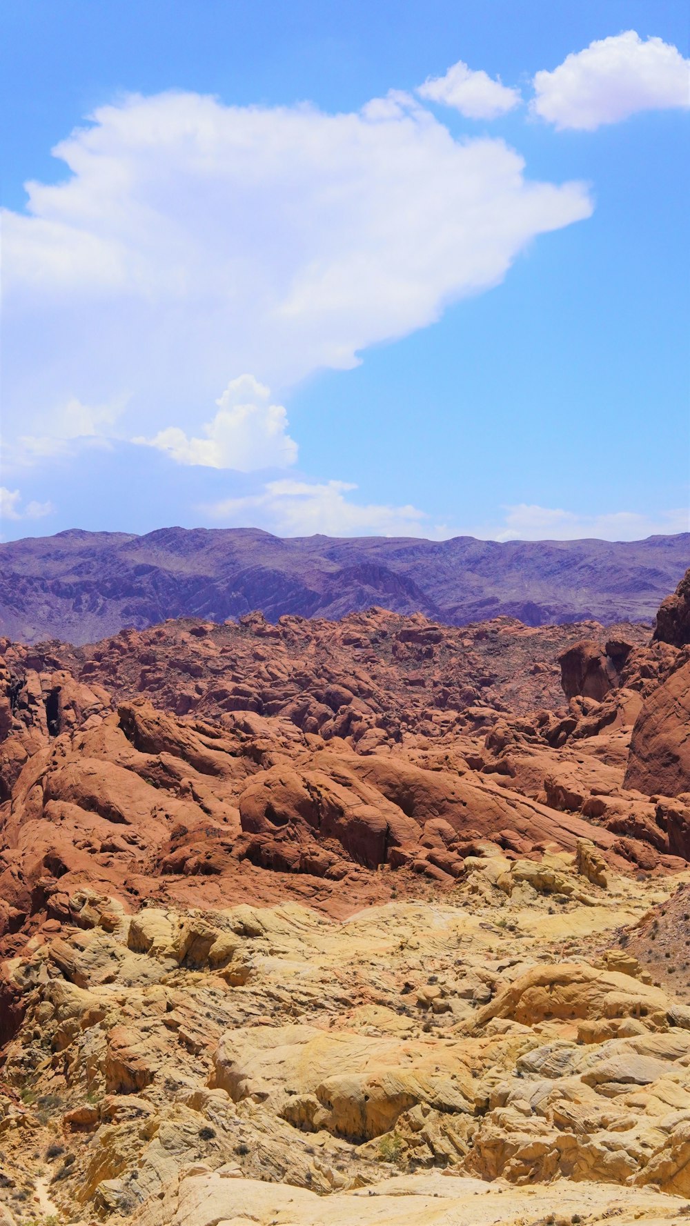 a rocky landscape with a blue sky