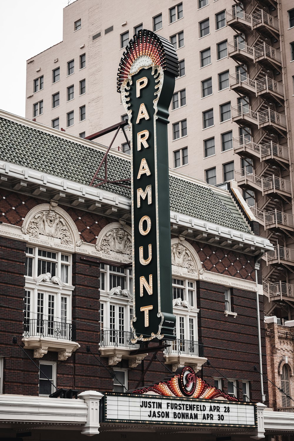 a tall building with a sign on it