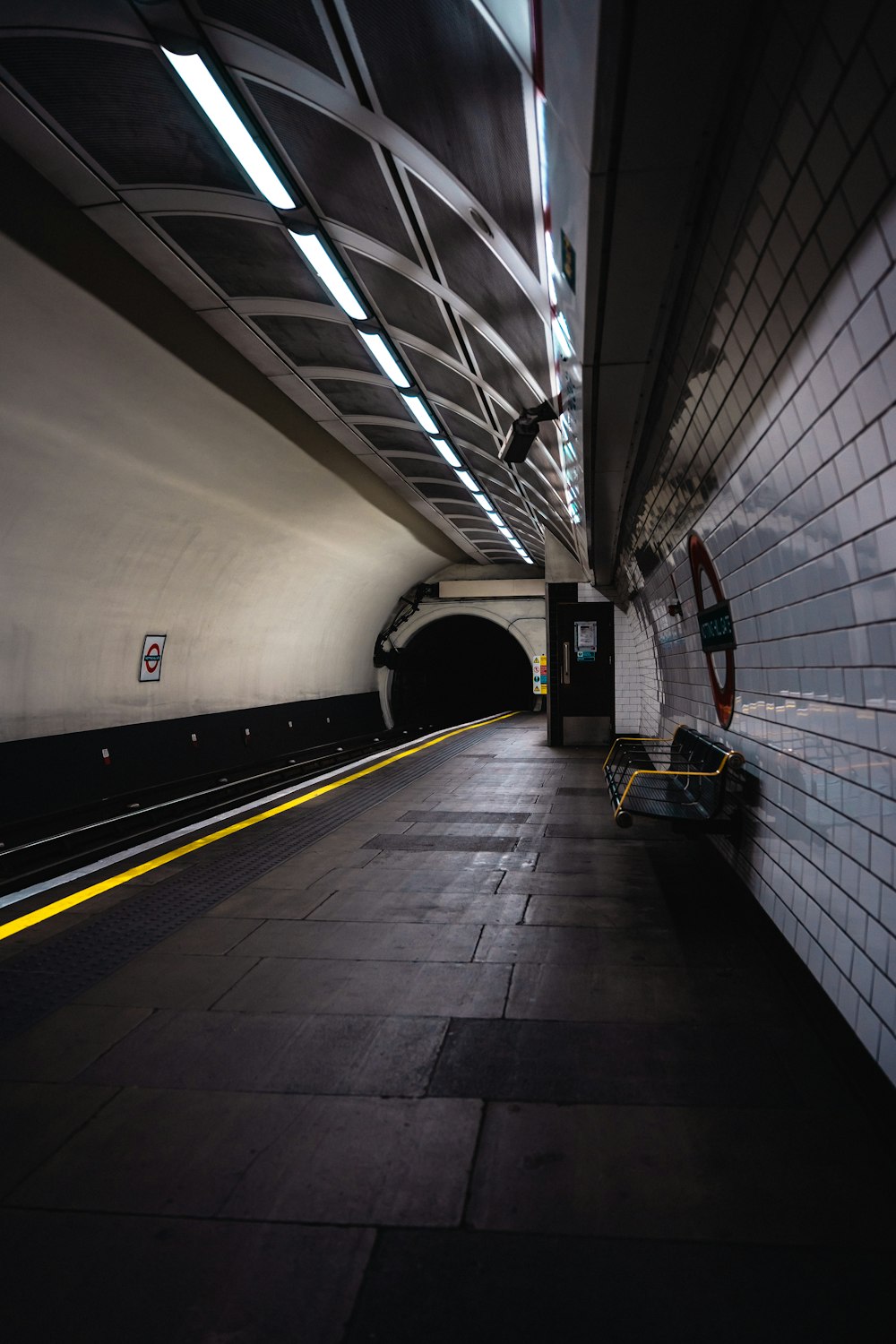 a tunnel with a bench