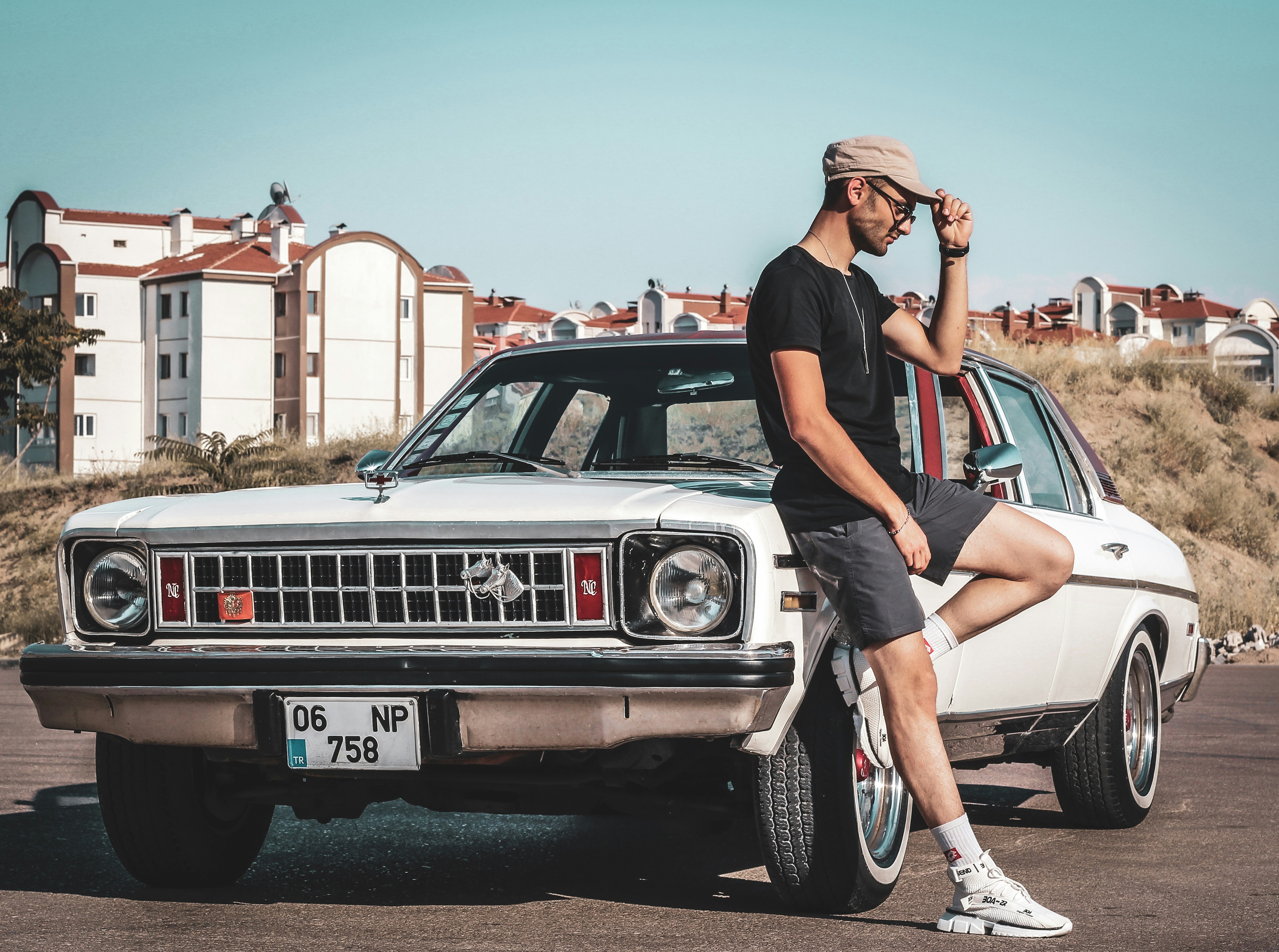 a person sitting on a car