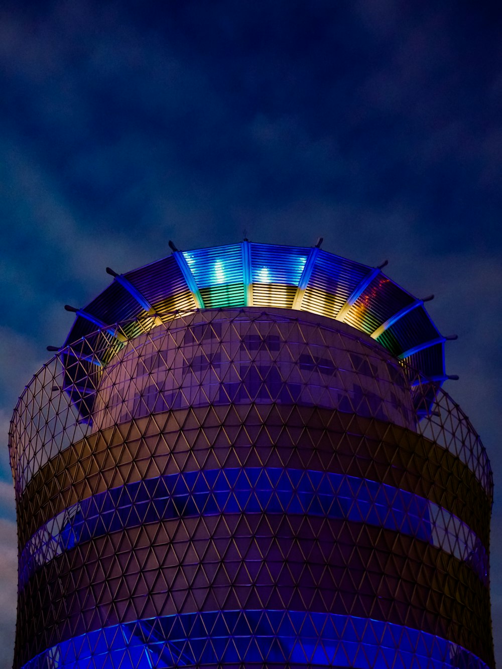 a tall building with a blue sky