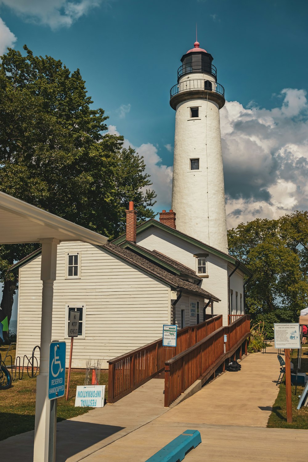 a lighthouse with a wooden walkway