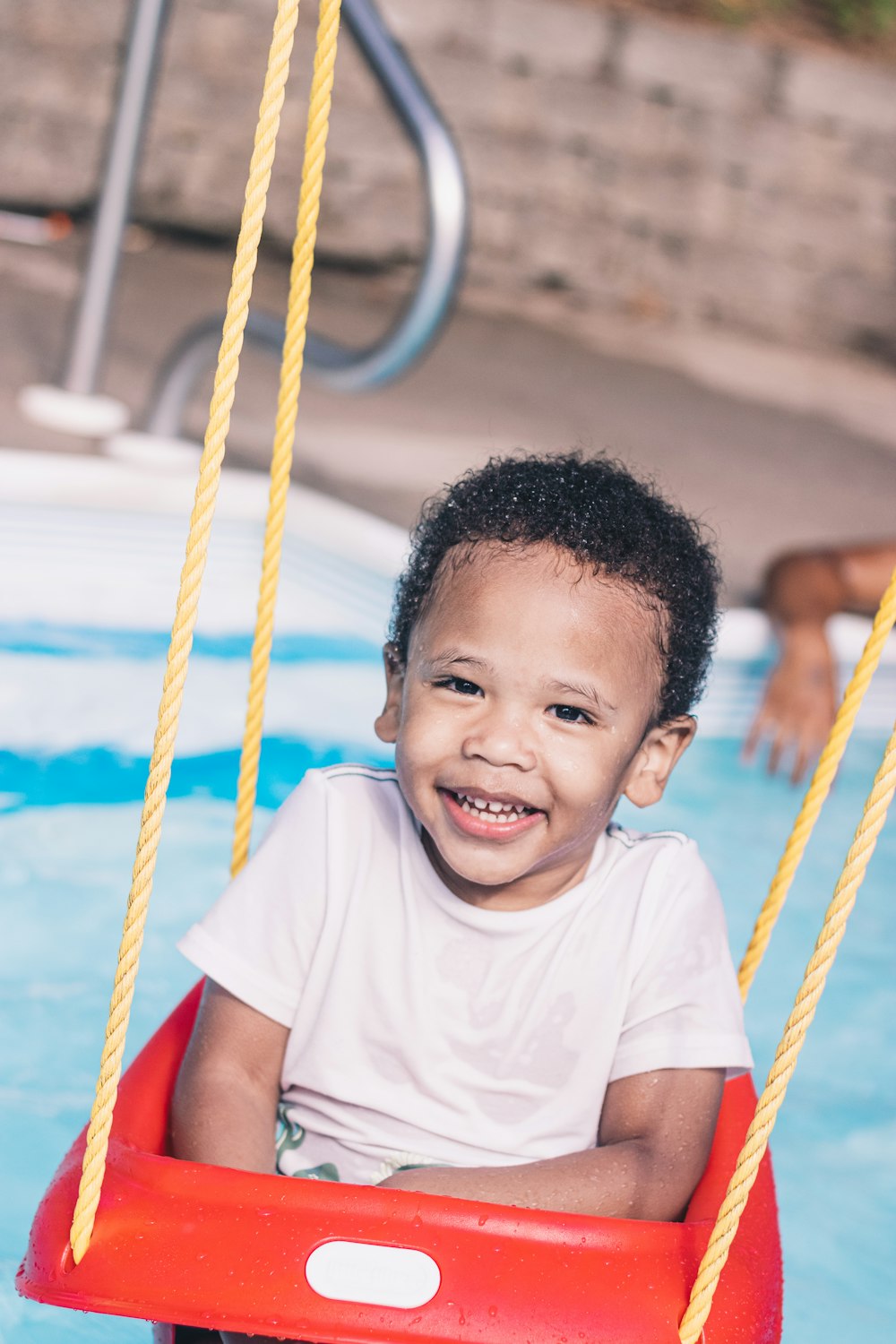 a boy in a pool