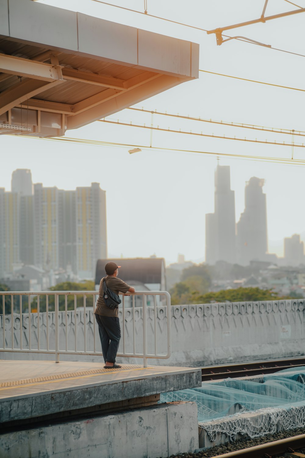 a man standing on a bridge