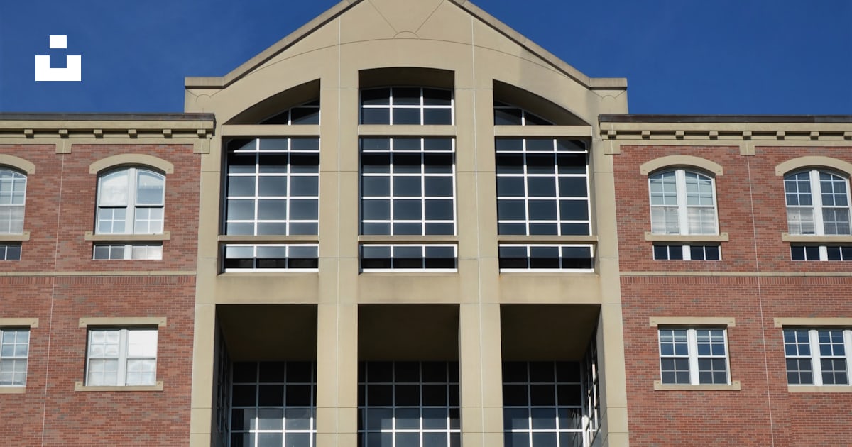 A Building With Stairs And Windows Photo Free Handrail Image On Unsplash a-building-with-stairs-and-windows-photo-free-handrail-image-on-unsplash