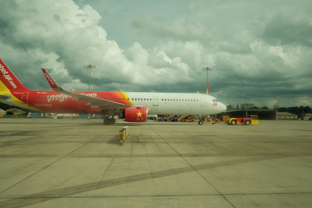 an airplane is parked at an airport