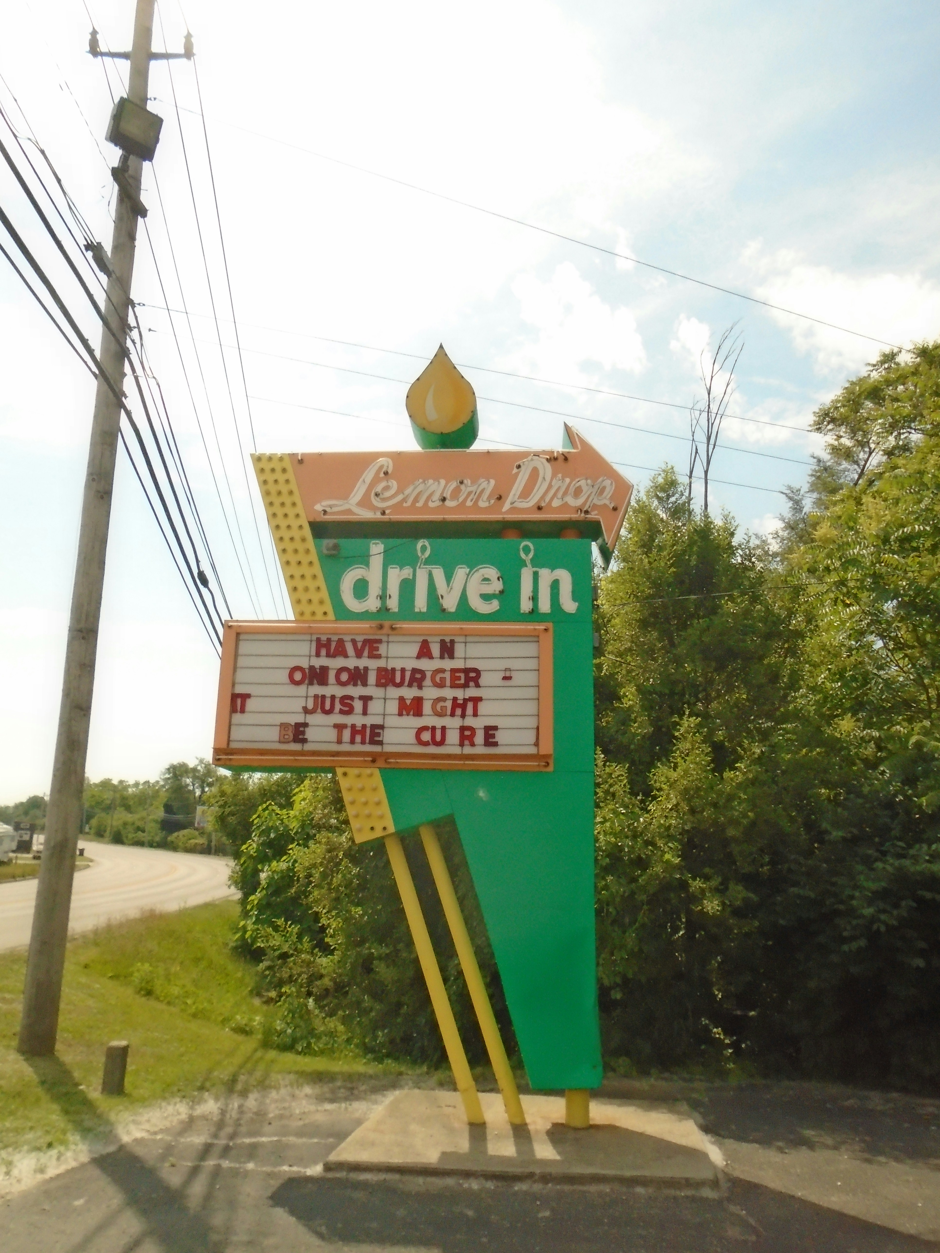 a sign on the side of a road